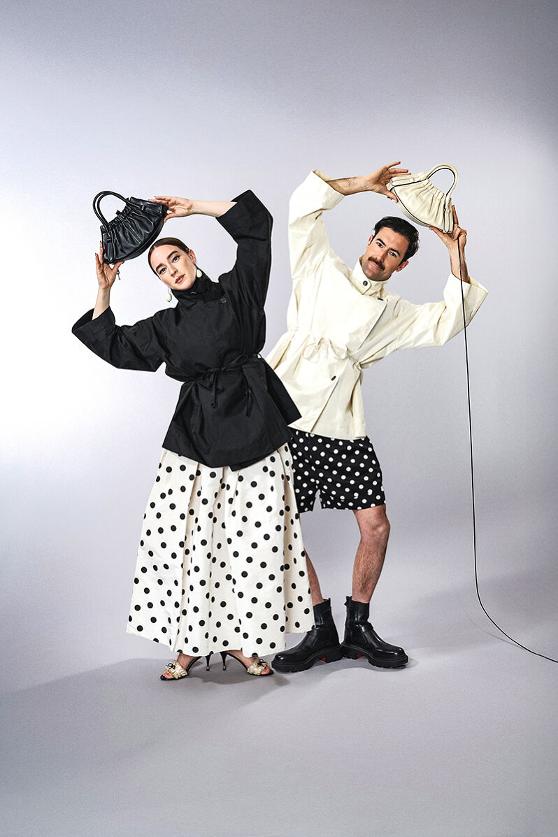 Visual artists Isabelle Chaput and Nelson Tiberghien, who work together under the moniker of Young Emperors, wear matching and complimentary outfits, like these black and cream polka dot looks, as a visual declaration of collaboration and love. 