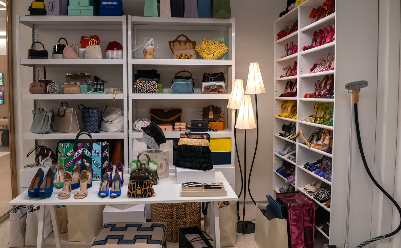 With totes, clutches, crossbody purses and a hat box bag from designer houses including Chanel, Louis Vuitton and Marc Jacobs, these shelves inside the Runway closet are handbag heaven.