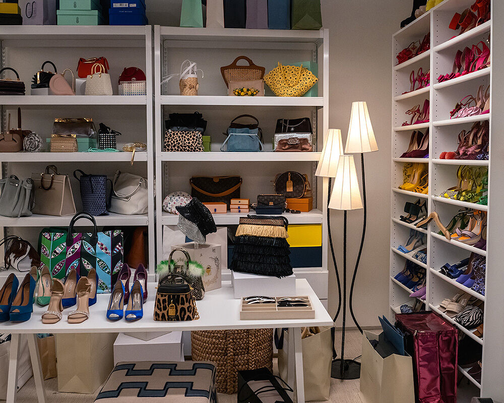 With totes, clutches, crossbody purses and a hat box bag from designer houses including Chanel, Louis Vuitton and Marc Jacobs, these shelves inside the Runway closet are handbag heaven.
