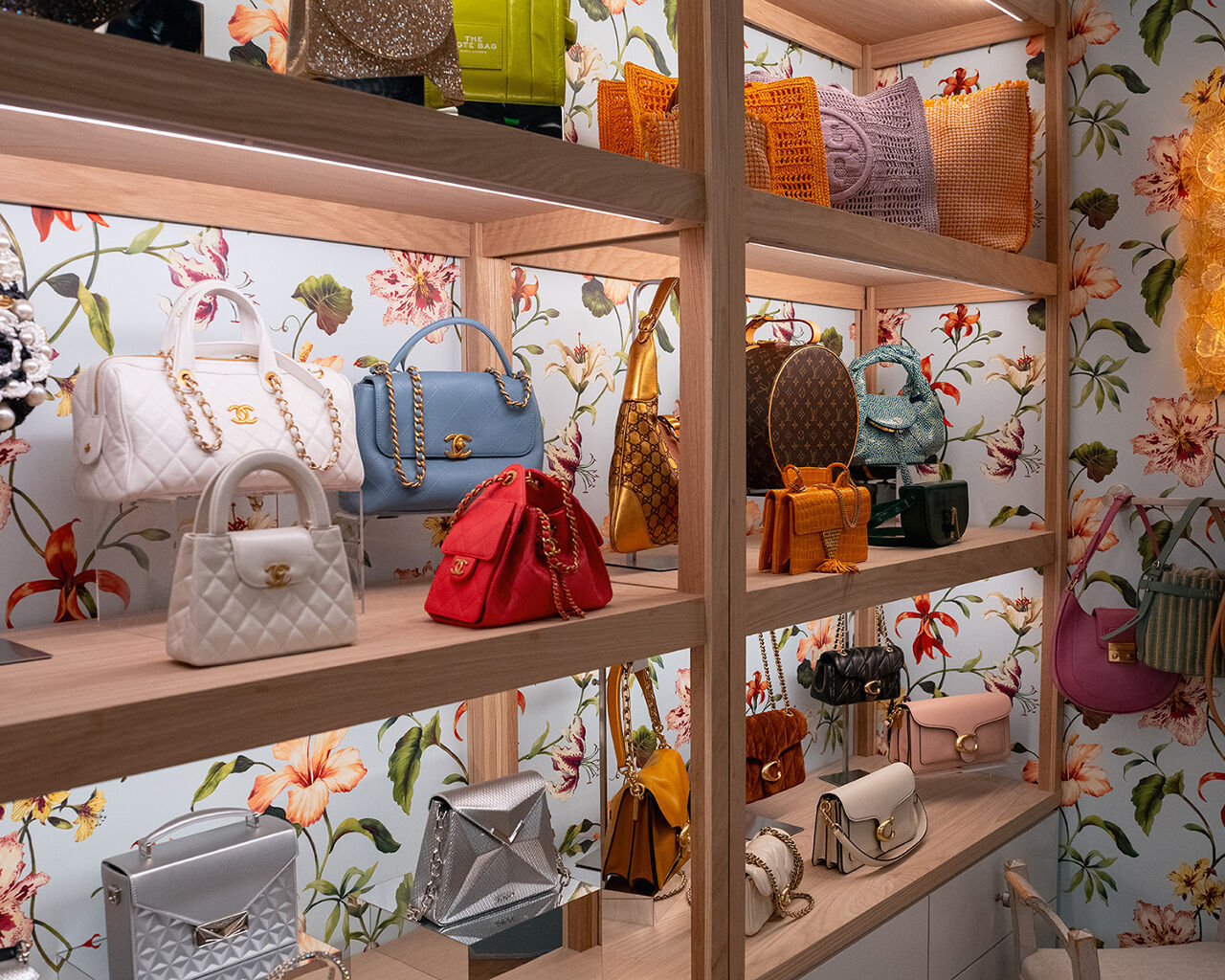 With totes, clutches, crossbody purses and a hat box bag from designer houses including Chanel, Louis Vuitton and Marc Jacobs, these shelves inside the Runway closet are handbag heaven.