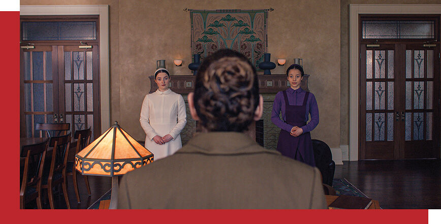 Ann Dowd returns to Gilead as Aunt Lydia, the headmistress at the elite prep school for future wives, in the upcoming Hulu Disney+ TV show, The Testaments, a spinoff of The Handmaid’s Tale. The coming-of-age story also stars Golden Globe nominee Chase Infiniti and Lucy Halliday.