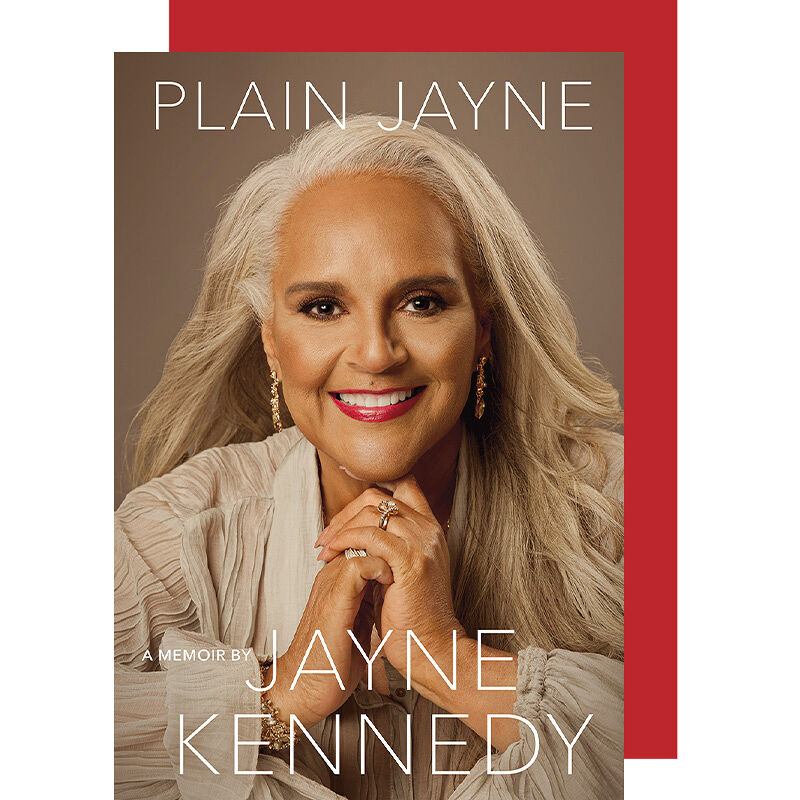 Book cover of Plain Jayne by sportscaster and actress Jayne Kennedy, which is a recommended read by Runway magazine.