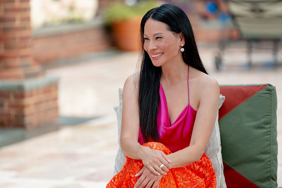 Looking radiant in pink and orange, Sasha Barnes smiles during her first interview in years.