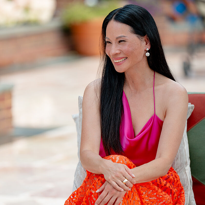 Looking radiant in pink and orange, Sasha Barnes smiles during her first interview in years. 
