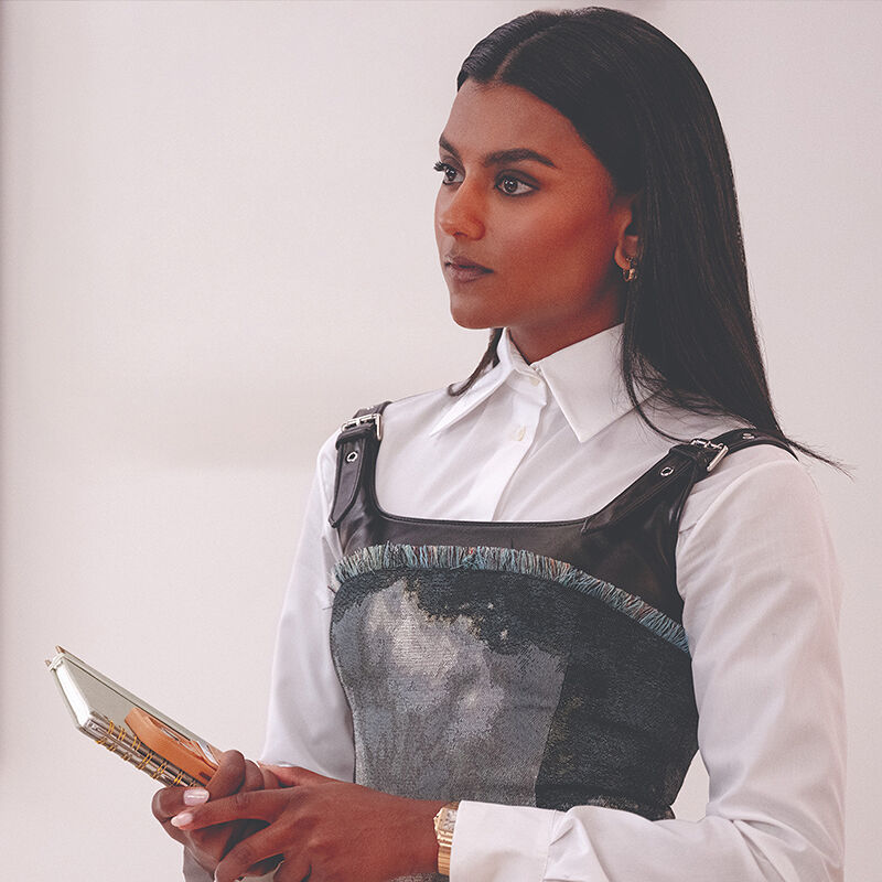 Amari Mari is the new Emily Charlton. As first assistant to Runway magazine editor Miranda Priestly, she stands ready to help make sure her boss’ day stays on schedule and runs smoothly.