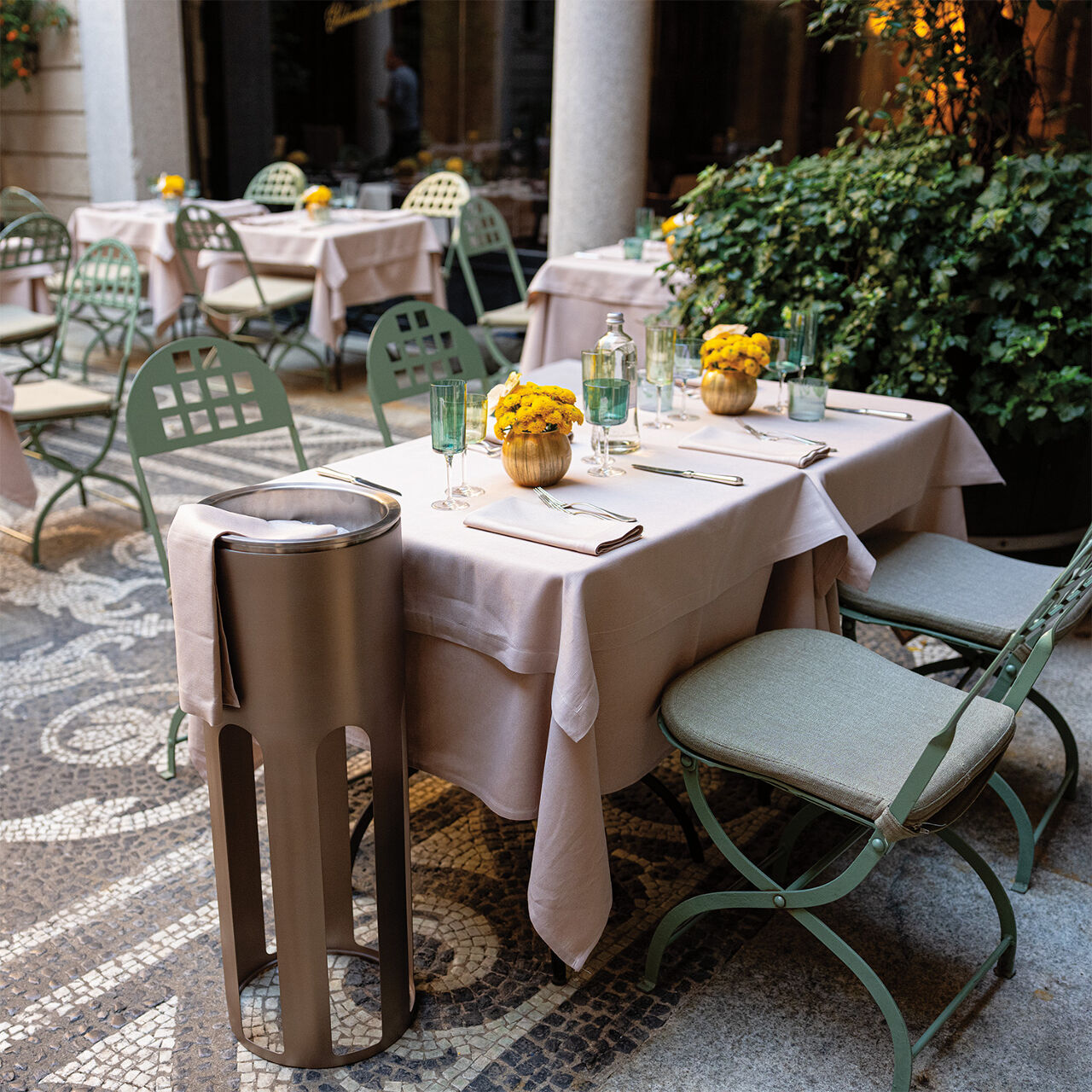 One of Milan’s many outdoor restaurant patios that are an excellent choice for a light lunch of seasonal risotto, pasta or vitello tonnato. This one features a mint green and yellow color scheme and a beautiful mosaic tile floor.