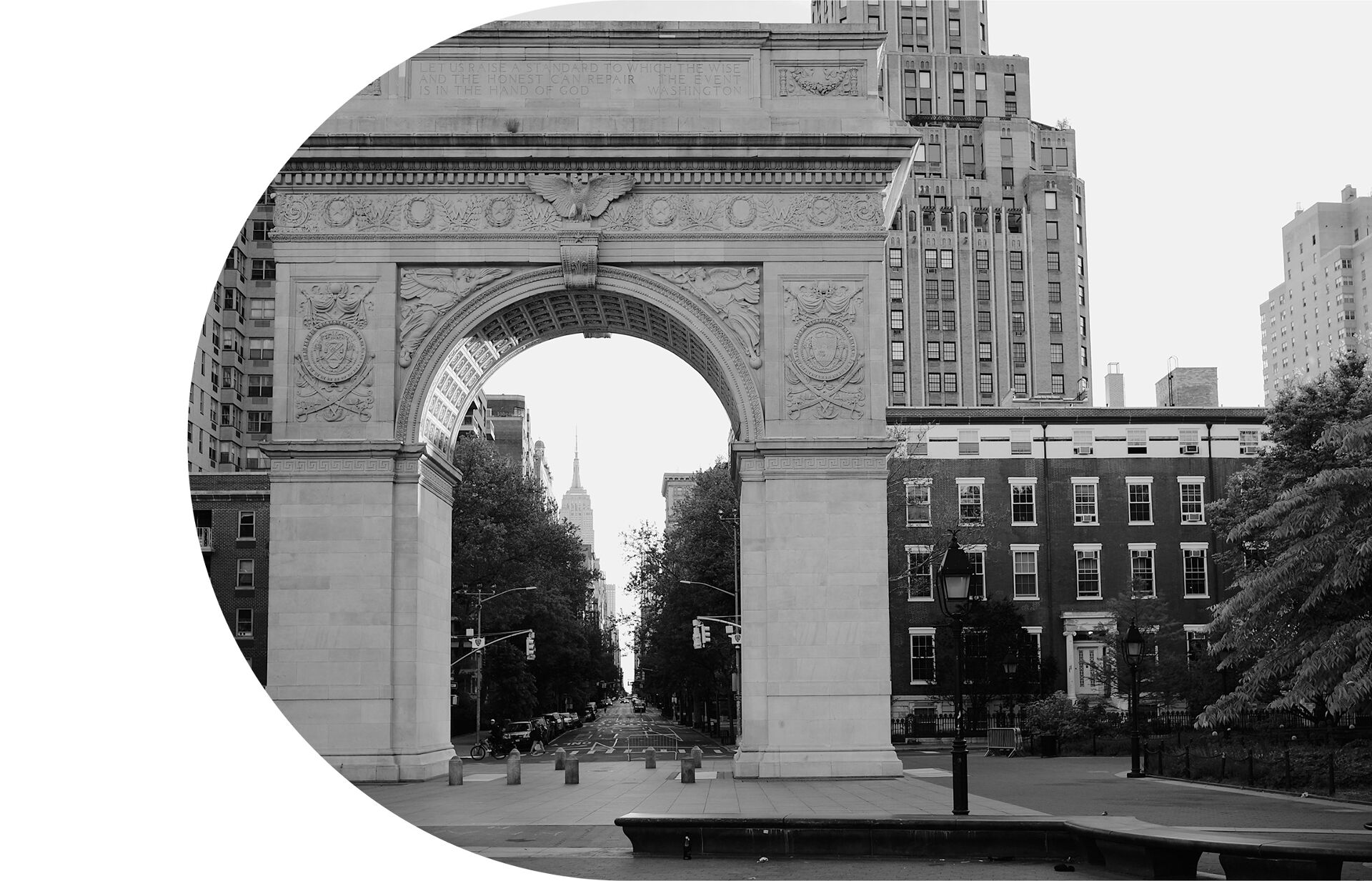 The towering Washington Arch, a marble tribute commemorating the centennial of George Washington’s presidential inauguration in 1789, looms over an empty Washington Square Park. 